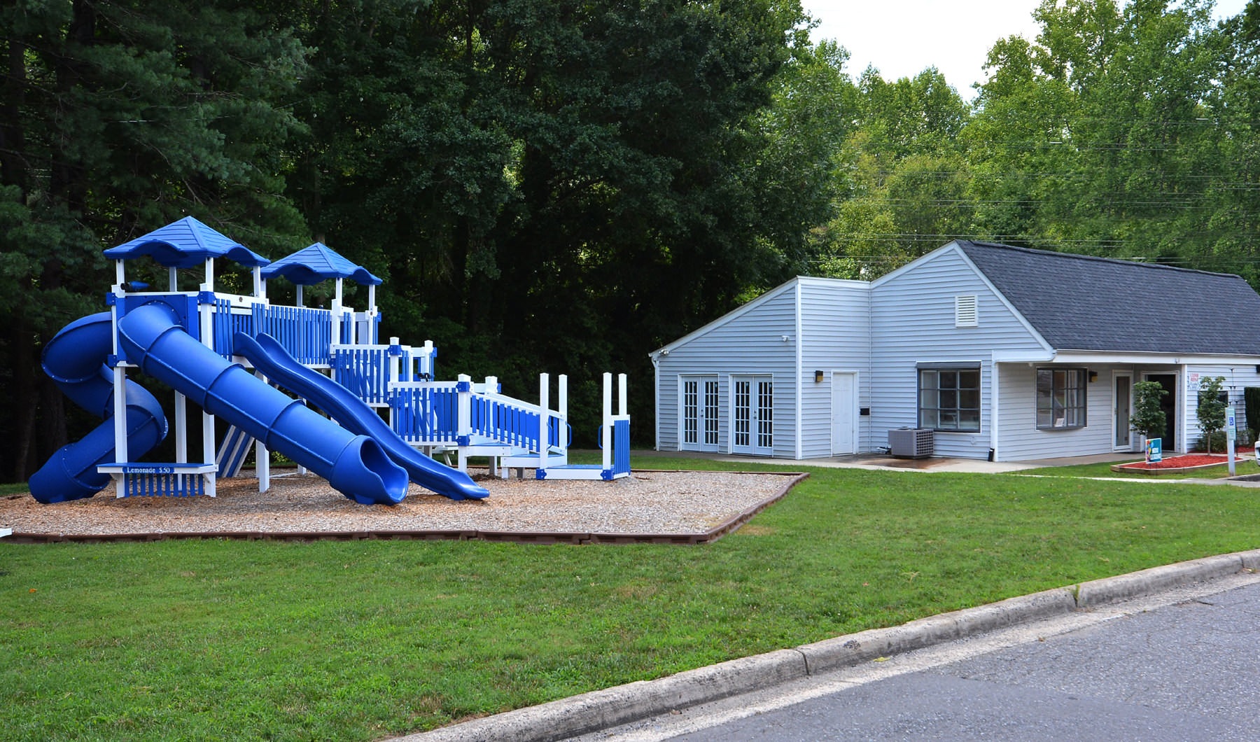 outdoor playground next to leasing office